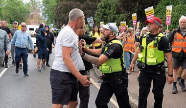 Angry residents protest outside the Bell Hotel in Epping, where concerns have not been addressed