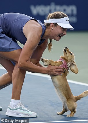 Anna Kalinskaya and her pet dog