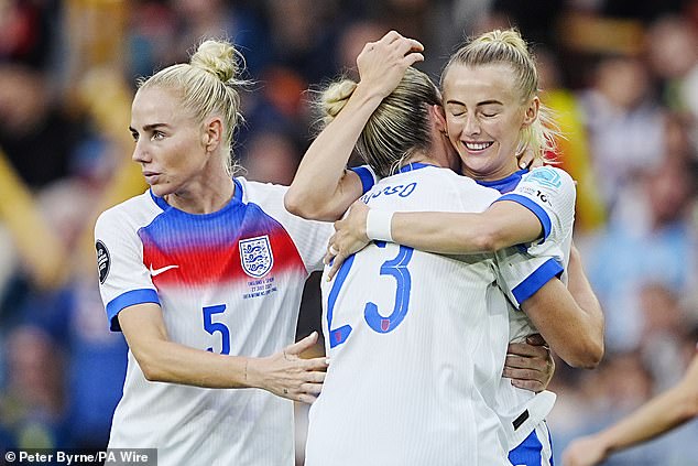 England's Alessia Russo (centre) celebrates scoring their side's first goal of the game with Chloe Kelly