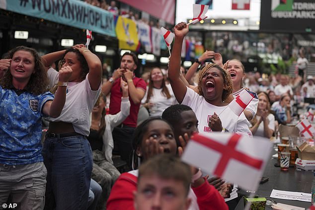 England supporters celebrate during the penalty shootout
