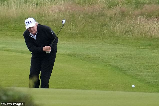 Video of President Donald Trump receiving 'help' from a caddie on the course went viral