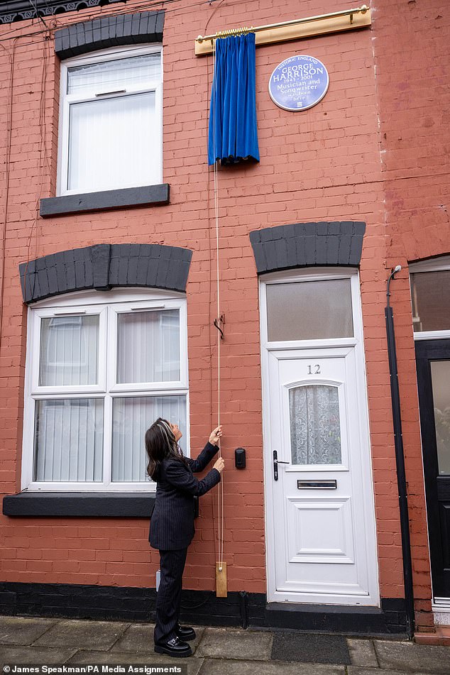 Harrison's widow, Olivia, unveils the plaque outside his childhood home in May 2024