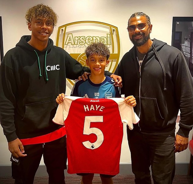 David Haye's 11-year-old son Kingston (centre) has signed for Arsenal's youth academy