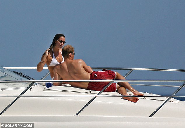 A taverna waiter in the pretty fishing village of Agia Efimia, where the Opera dropped anchor, tells me the royals were taken to the harbour by tender boat. Pictured: Prince William and then girlfriend Kate Middleton relaxing with friends on a boat in Ibiza in September 2006 aboard her uncle Gary Goldsmith's yacht