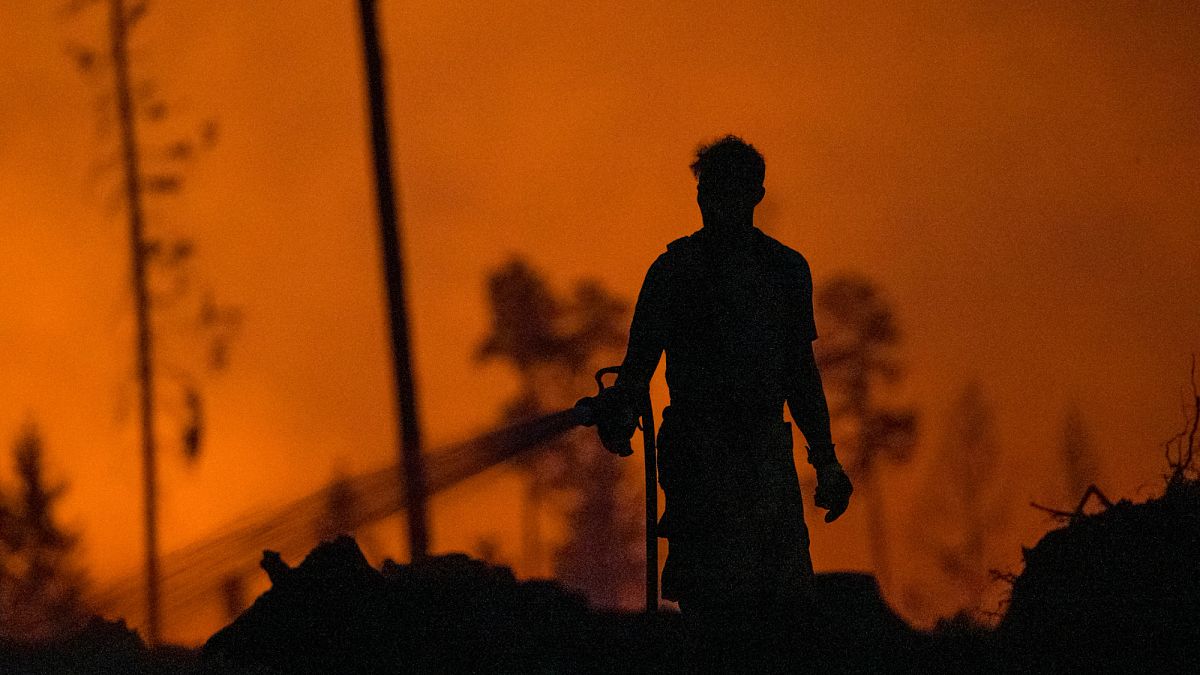 Wildfires in eastern Germany injure two firefighters and force villages to evacuate