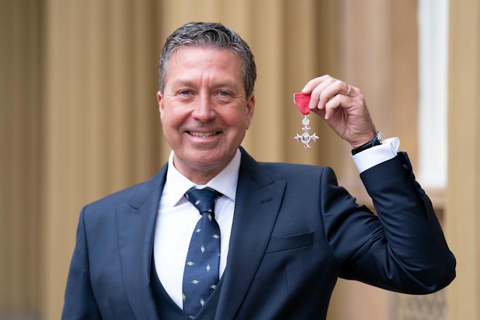  John Torode after being made an MBE during an investiture ceremony at Buckingham Palace.
