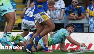 Owen Dagnall touching the ball on the try line