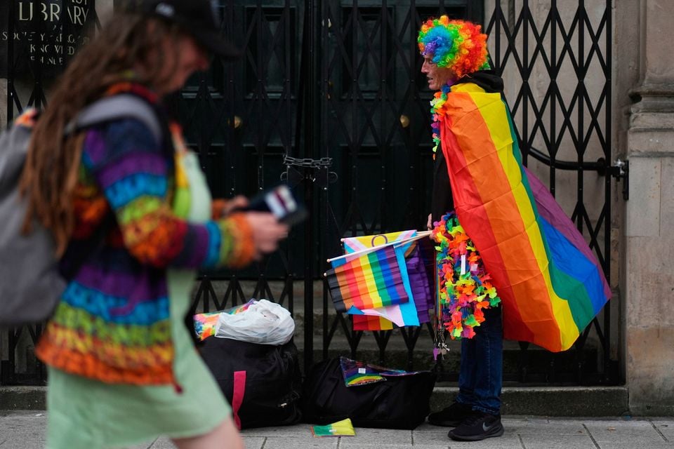 Pride flags for sale ahead of the Belfast Pride Parade, in the city centre.  Brian Lawless/PA Wire