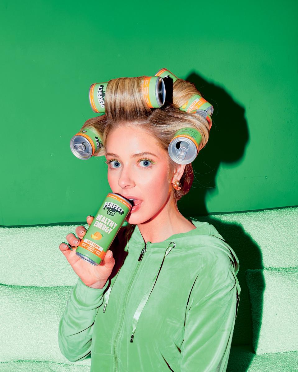 Perfect Ted co-founder, Marisa Poster, with drinks cans for hair rollers