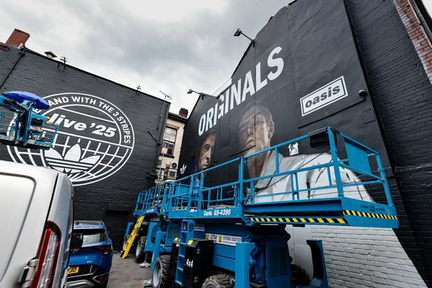 The mural also coincides with the reopening of the Adidas store on Market Street