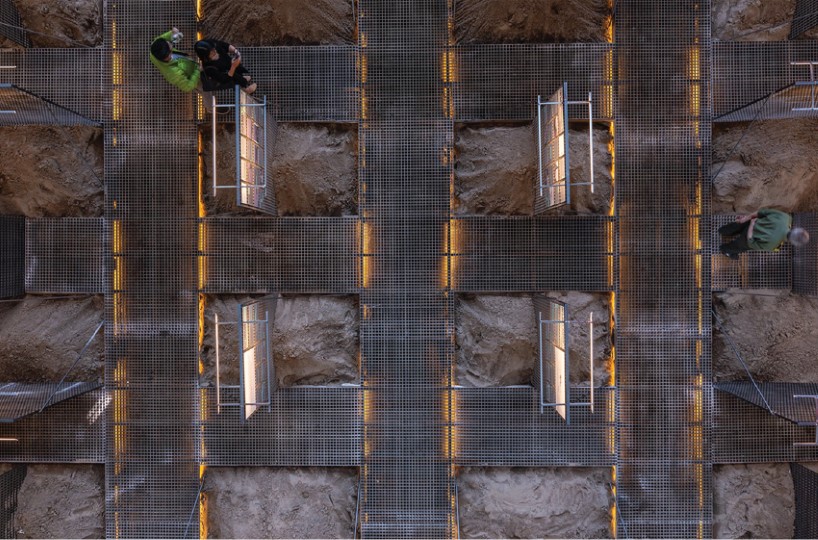 the grid by ad hoc practice repurposes former train factory in hanoi as exhibition space