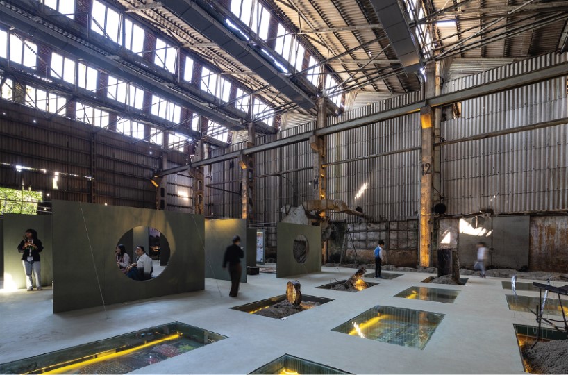 the grid by ad hoc practice repurposes former train factory in hanoi as exhibition space