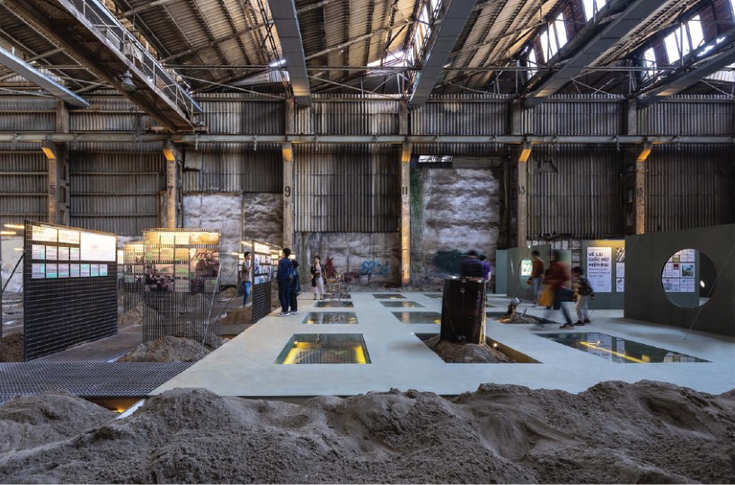 the grid by ad hoc practice repurposes former train factory in hanoi as exhibition space
