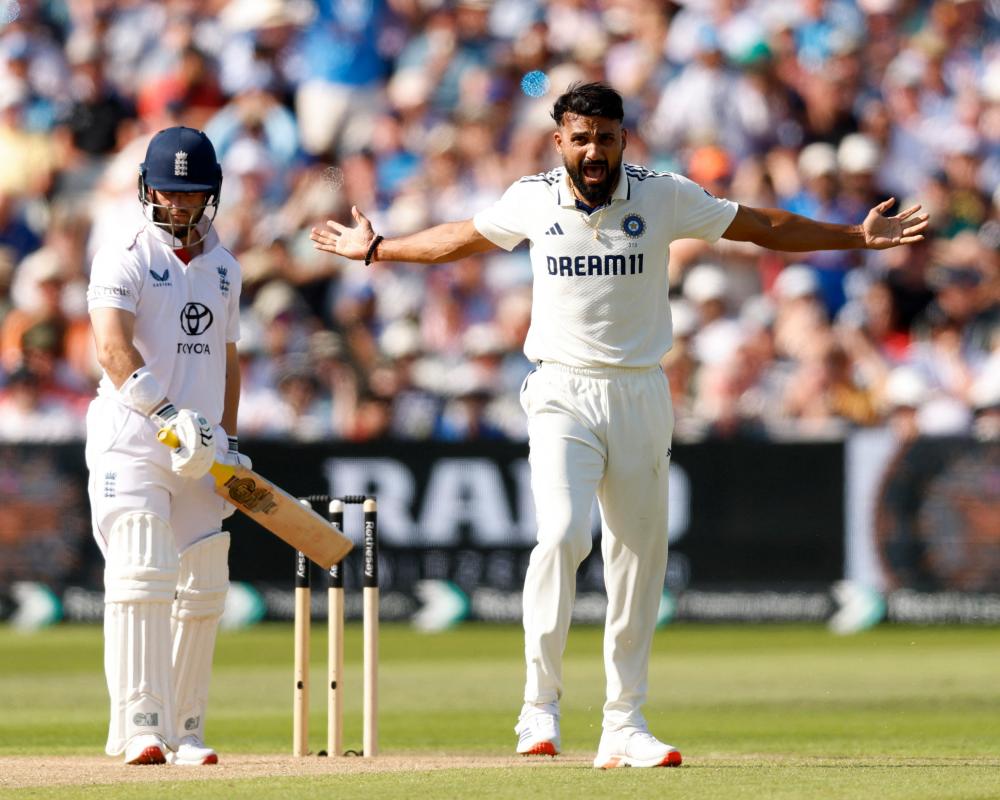 India’s Akash Deep celebrates after taking the wicket of England's Ben Duckett