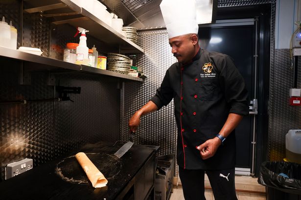 A dosa being prepared