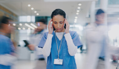 Nurse Looks Stressed At Work