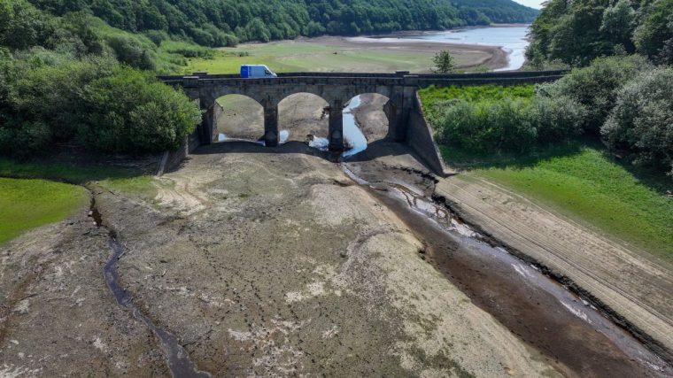 OTLEY, ENGLAND - JUNE 17: In this aerial view, low water levels reveal the reservoir bed at Lindley Wood Reservoir in Yorkshire after the driest spring in 132 years on June 17, 2025 in Otley, England. Yorkshire has become the second region to declare drought status by the Environment Agency (EA) after low rainfall this year and reservoirs at 64.6% capacity, below the expected 80-85% at this time of year. (Photo by Christopher Furlong/Getty Images)