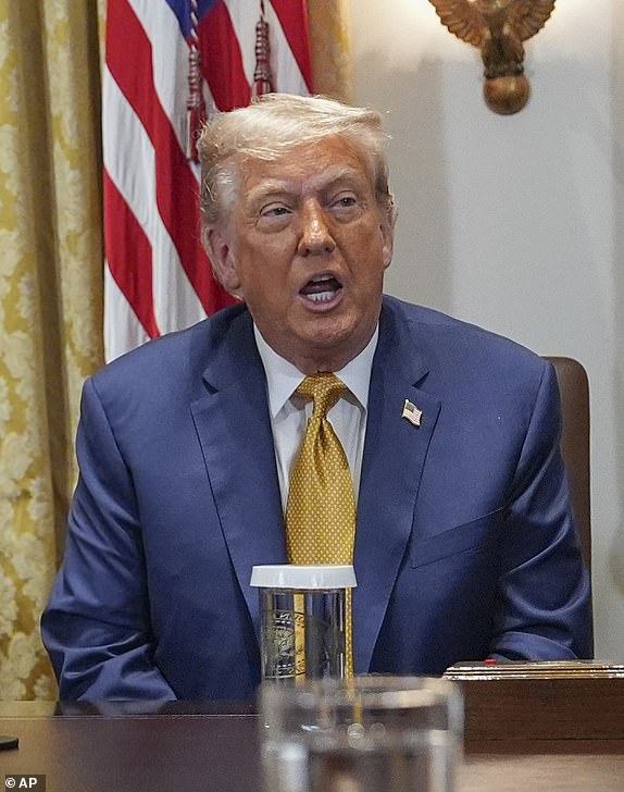 President Donald Trump, center, seated with Secretary of State Marco Rubio, left, and Secretary of Defense Pete Hegseth, right, during a cabinet meeting at the White House, Tuesday, July 8, 2025, in Washington. (AP Photo/Evan Vucci)