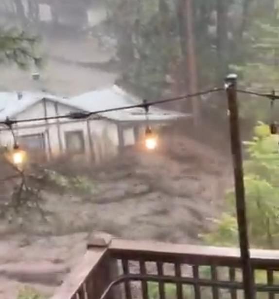 Grab showing a house washing away14885403 Texas flood death toll climbs to 111 and 173 still missing as residents are urged to 'seek higher ground now' amid life-threatening flash flood warning