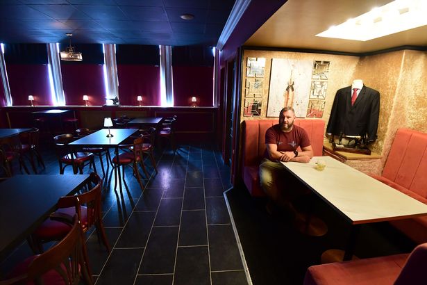 Tailors is far bigger than the small fireplace you step through