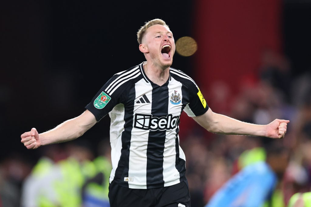 Sean Longstaff celebrates Newcastle United's Carabao Cup win over Nottingham Forest.