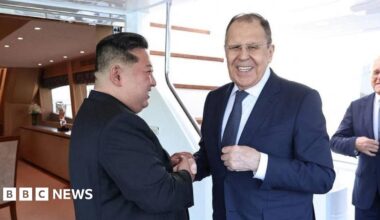 North Korean leader Kim Jong Un shakes hands with Russian Foreign Minister Sergei Lavrov during a meeting in Wonsan, North Korea