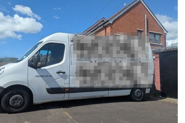 Politicians condemn those behind van covered in racist graffiti in west Belfast