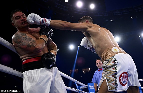 David Nyika (right) and Nikolas Charalampous during their undercard bout ahead of the Boxing match between Paul Gallen and Sonny Bill Williams at Qudos Bank Arena in Sydney, Wednesday, July 16, 2025. (AAP Image/Dan Himbrechts) NO ARCHIVING, EDITORIAL USE ONLY