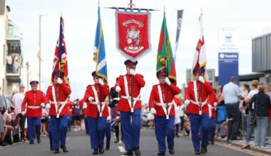Portrush band parade gets under way after The Open tee-times moved to avoid clash