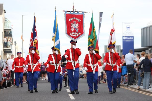Portrush band parade gets under way after The Open tee-times moved to avoid clash