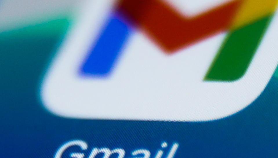 Gmail app on screen.