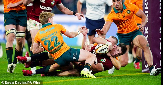 Huw Jones of the British and Irish Lions scoring his sides third try during the Qatar Airways Lions Tour 2025, second test match at the Melbourne Cricket Ground, Melbourne, Australia. Picture date: Saturday July 26, 2025. PA Photo. Photo credit should read: David Davies/PA Wire.RESTRICTIONS: Use subject to restrictions. Editorial use only, no commercial use without prior consent from rights holder.