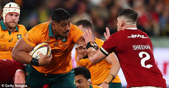 MELBOURNE, AUSTRALIA - JULY 26: Will Skelton of the Wallabies evades a tackle during the second test of the series between Australia Wallabies and British & Irish Lions at the Melbourne Cricket Ground on July 26, 2025 in Melbourne, Australia. (Photo by Morgan Hancock/Getty Images)