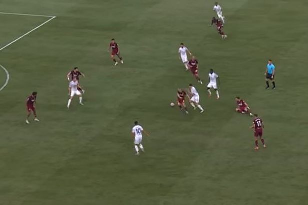 Manuel Ugarte pictured beating James Ward-Prowse during Manchester United's win over West Ham