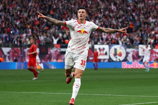 Bejamin Sesko celebrates after scoring for RB Leipzig.