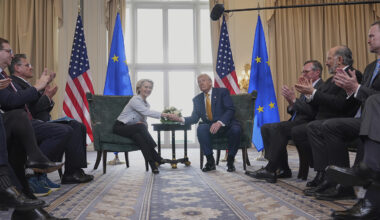 President Donald Trump, right, and European Commission President Ursula von der Leyen, left, shown shaking hands while seated at a recent meeting in Scotland.