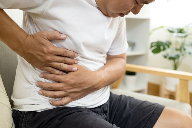 Asian male patient with abdominal pain on right side belly