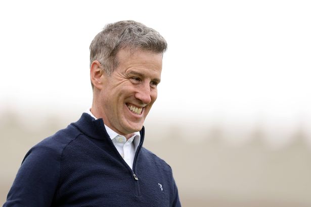 VIRGINIA WATER, ENGLAND - SEPTEMBER 18: Anton Du Beke smiles as he leaves the first tee during the Pro-Am prior to the BMW PGA Championship 2024 at Wentworth Club on September 18, 2024 in Virginia Water, England. (Photo by Richard Heathcote/Getty Images)