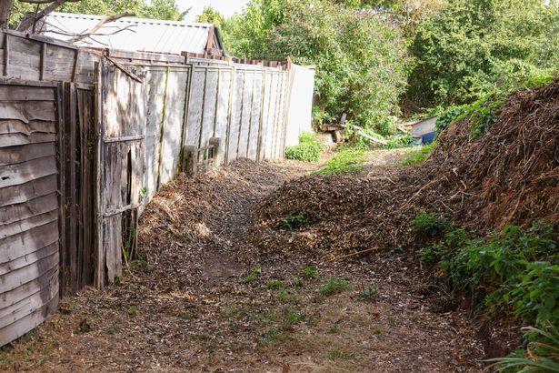 Huge piles of woodchippings have been dumped on Belroyal Lane, blocking vehicle access to the back of the gardens and garages for residents of Belroyal Avenue in Broomhill.