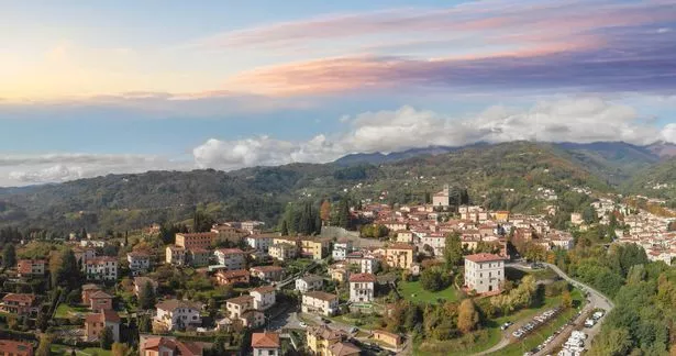 Panoramic aerial view of Barga at sunset, Garfagnana - Tuscany.