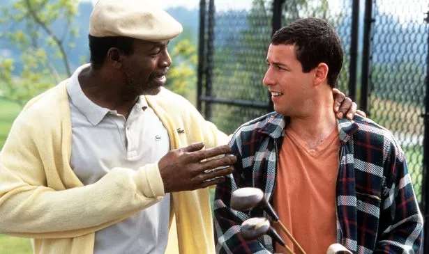 Carl Weathers and Adam Sandler