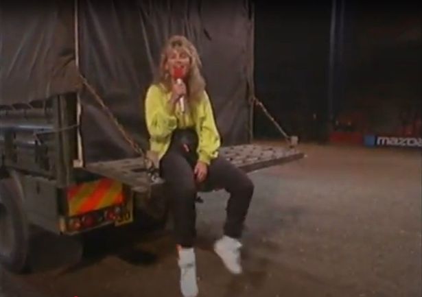 Anthea Turner was presenting while sitting on the back of truck with a stunt rider inside