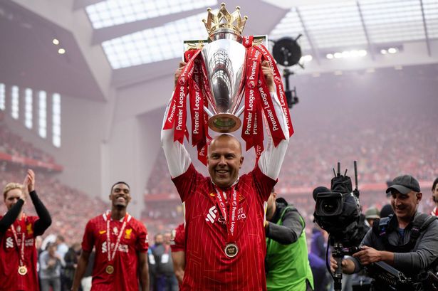 Arne Slot lifting the Premier League trophy in May 2025