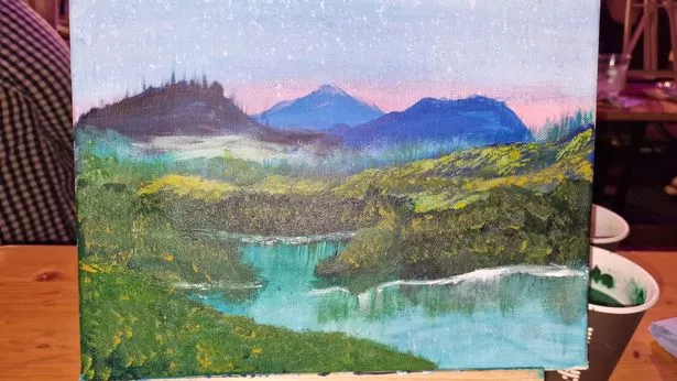 The finished "masterpiece" produced at the Bob Ross painting class