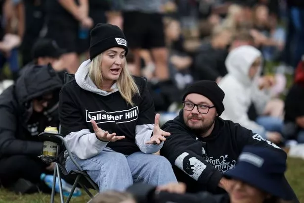 Oasis fans on Gallagher Hill have been given free t-shirts 