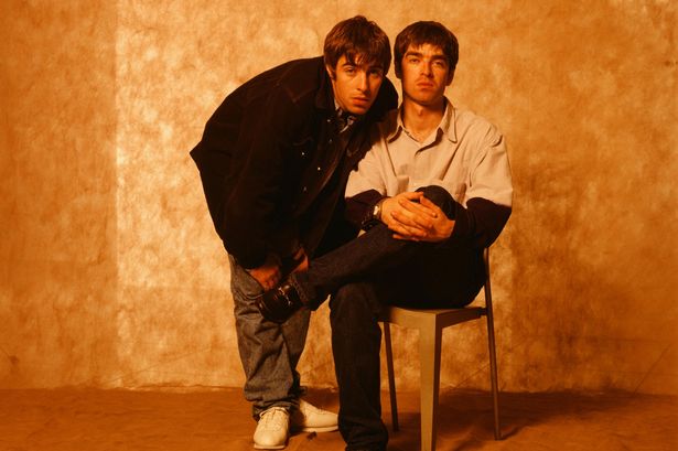  Liam Gallagher and Noel Gallagher of Oasis, at a photoshoot in a hotel in Tokyo, September 1994