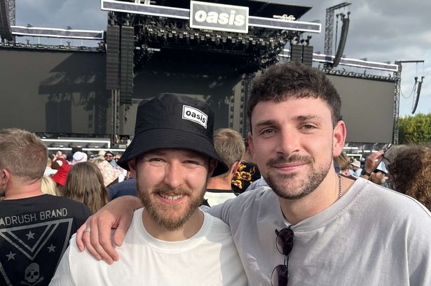 Lewis and his friend Tom at the Oasis show on Wednesday night 
