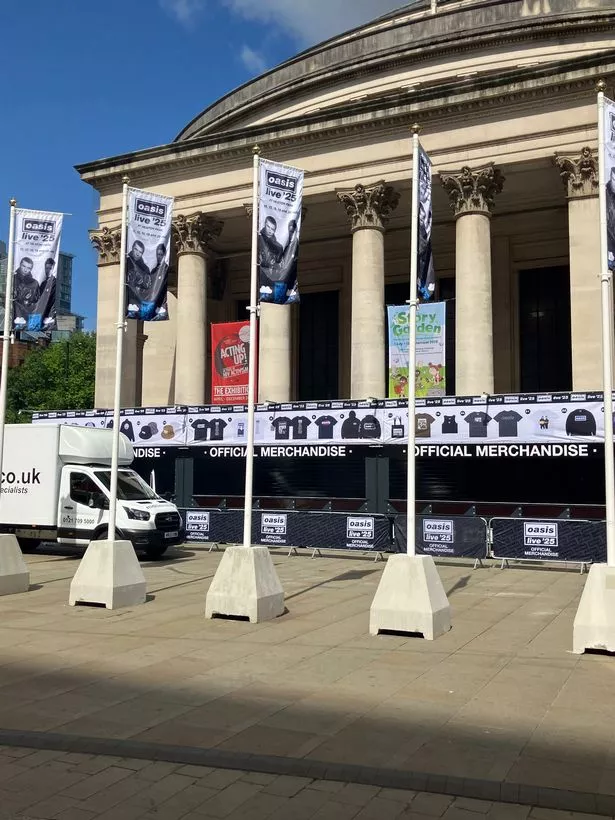 Oasis merch stands have started going up in Manchester city centre