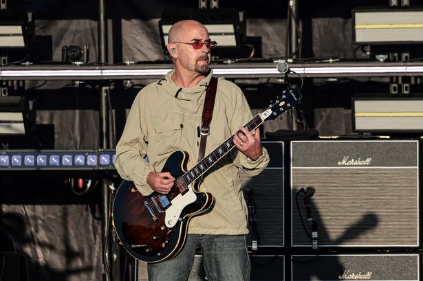 Bonehead playing with Oasis at Heaton Park on Friday night (July 11)