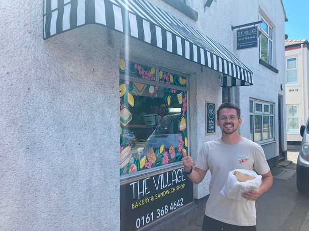 YouTuber Tom Cassell outside the Village Bakery and Sandwich Shop in Gee Cross